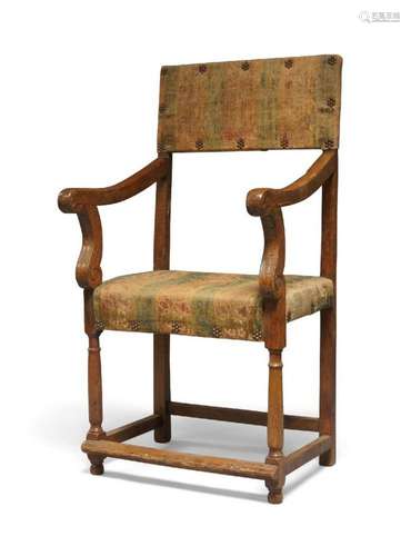 A Continental walnut open armchair, probably 18th Century, w...