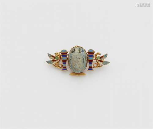 An 18k gold brooch with an Egyptian scarab amulet