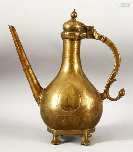 A LARGE 18TH CENTURY MUGHAL INDIAN BRASS EWER, with engraved...