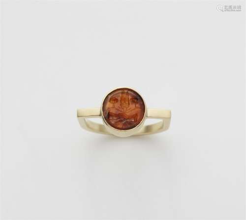 A 14k gold gentleman's ring with a Roman intaglio