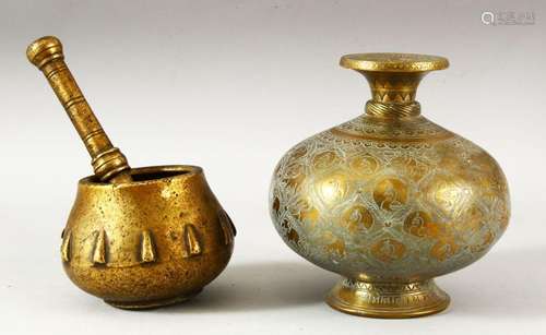 A 17TH/18TH CENTURY MUGHAL BRASS PESTLE AND MORTAR, together...