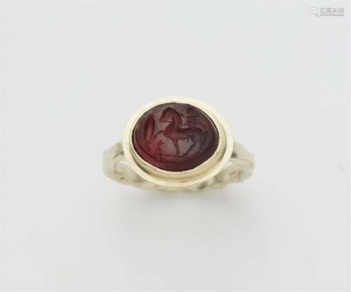 A 14k gold gentleman's ring with a Roman intaglio