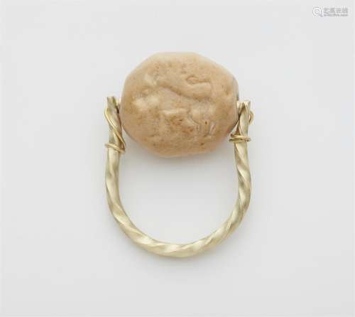 A 14k gold ring with an ancient intaglio