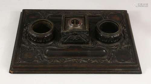 A 19TH CENTURY SRI LANKAN OR CEYLONESE CARVED EBONY DOUBLE S...