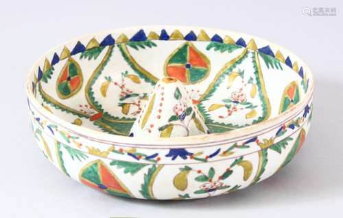 A TURKISH KUTAHYA POTTERY LEMON SQUEEZE - decorated with flo...