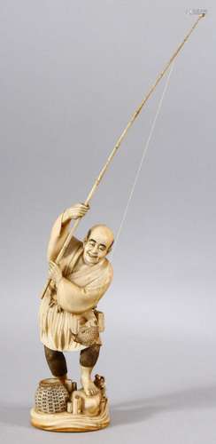 A LARGE JAPANESE MEIJI PERIOD CARVED IVORY OKIMONO - FISHERM...