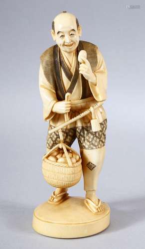 A JAPANESE MEIJI PERIOD CARVED IVORY OKIMONO - - the man sto...