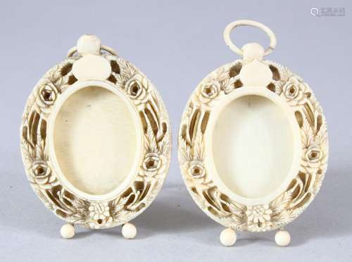 A PAIR OF 19TH CENTURY CHINESE CANTON CARVED IVORY MINIATURE...