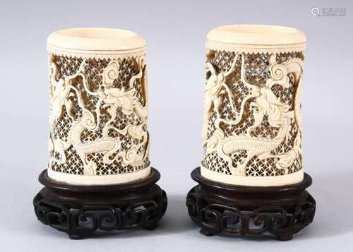 A PAIR OF 19TH CENTURY CHINESE CANTON CARVED IVORY OPENWORK ...