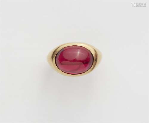 An 18k gold ring with a verneil ruby