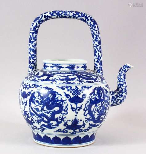 A LARGE CHINESE BLUE AND WHITE TEA POT, painted with roundel...