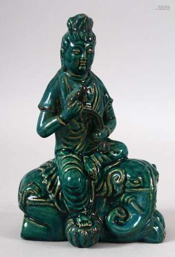 A CHINESE SONG STYLE TURQUOISE GLAZED FIGURE OF GUYANYIN - s...