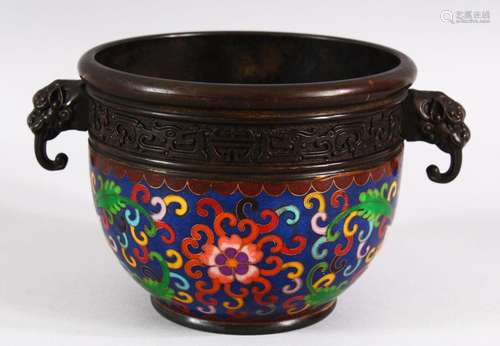 A CHINESE CLOISONNE TWIN HANDLE INCENSE BURNER - the body wi...