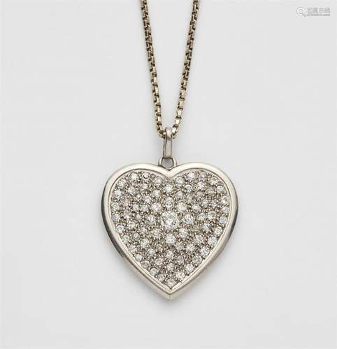 An Art Déco platinum and 18k white gold diamond pendant