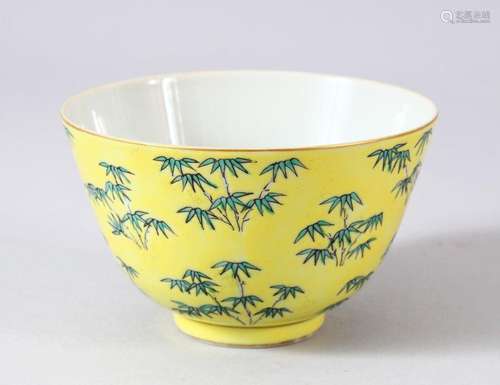 A CHINESE FAMILLE JAUNE PORCELAIN BOWL, decorated with leaf ...