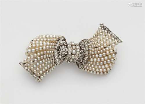 A Belle Epoque platinum bow brooch