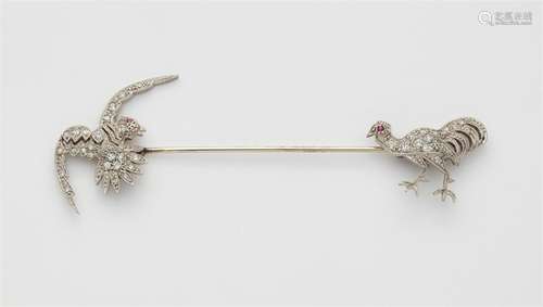 An Art Déco 18k white gold pin brooch