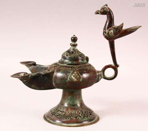 A PATINATED BRONZE OPENWORK INCENSE BURNER, the handle in th...