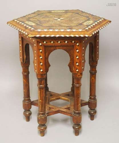 A 19TH CENTURY SPANISH INLAID OCTAGONAL WOODEN TABLE, the to...