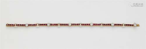 An 18k gold ruby and diamond rivière bracelet