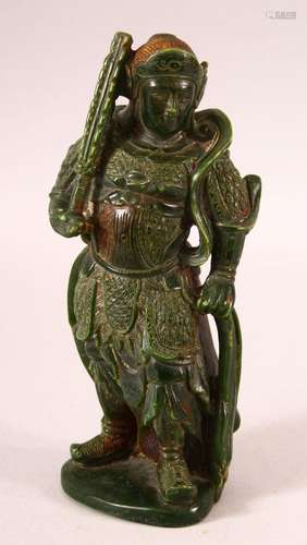 A CHINESE CARVED JADE FIGURE OF A WARRIOR, 22cm high.