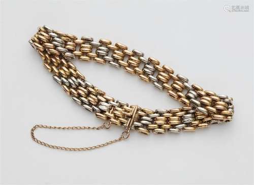 A bi-colour 14k gold chain bracelet