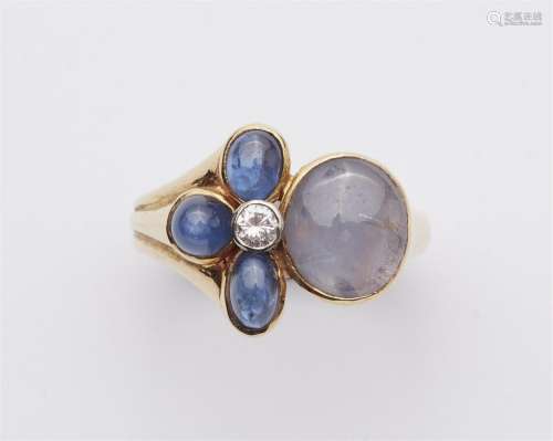 A 14k gold star sapphire ring