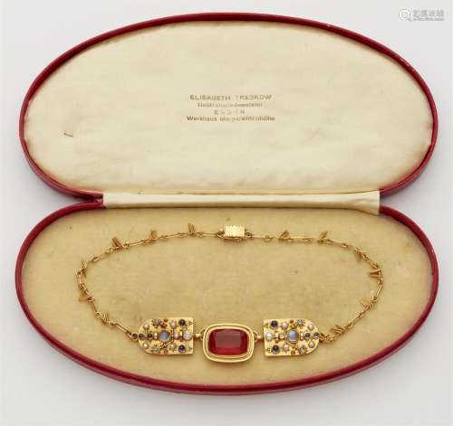 A 14k gold gemstone necklace