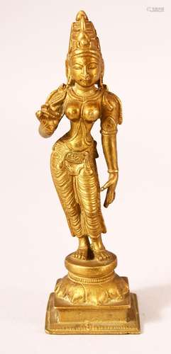 AN 19TH CENTURY SOUTH INDIAN BRONZE FIGURE, 16cm high.