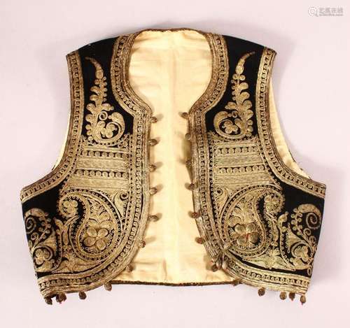 AN OTTOMAN EMBROIDERED BAKLANS CHILD WAISTCOAT - wiht a blac...