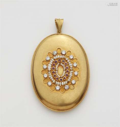 An 18k gold diamond and pearl pendant