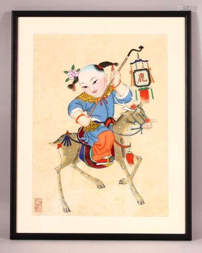 A CHINESE FRAMED PAINTING OF A BOY UPON DEER - the boy seate...