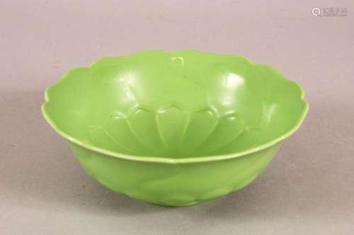 A CHINESE GREEN GLAZED LOTUS FORMED PORCELAIN PETAL DISH - w...