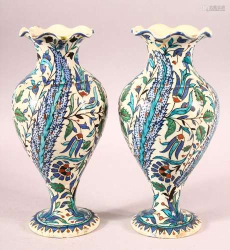 A PAIR OF TURKISH OTTOMAN KUTAHIYA POTTERY VASES, painted wi...