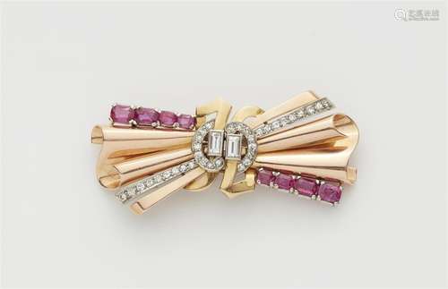 A 14k tri-colour gold ruby double clip brooch