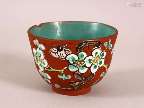 A CHINESE YIXING CLAY TEA BOWL - the exterior enameled with ...