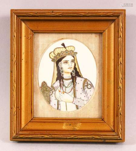 A 19TH CENTURY INDIAN IVORY SLITHER PAINTING OF A FEMALE - t...