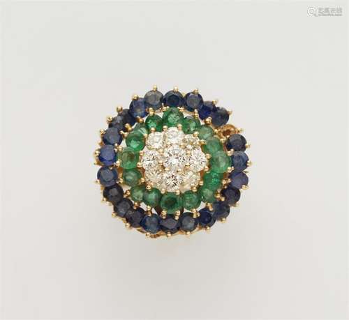 An 18k gold gemstone ring