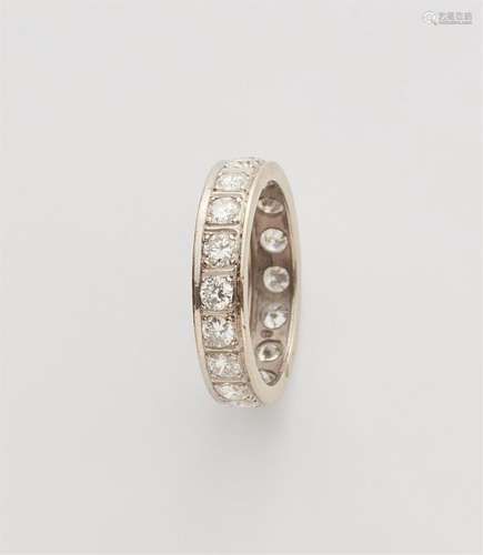 A 14k white gold diamond eternity ring