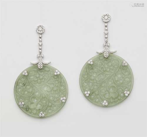 A pair of platinum jade and diamond earrings