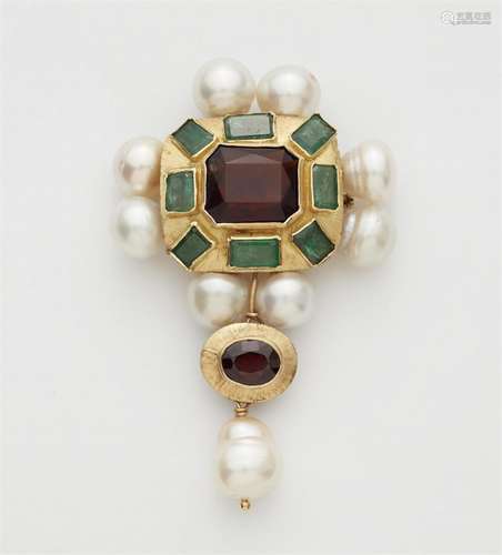 An 18k gold coloured gemstone and South Sea pearl pendant br...