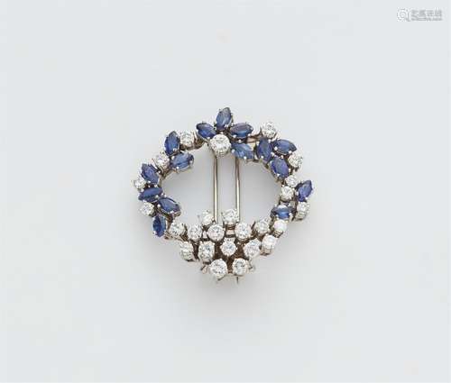 An 18k white gold wreath brooch