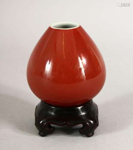 A KANGXI SONG DE BOEUF PEACH VASE and stand, six character m...