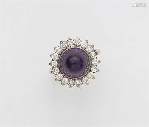 A 14k white gold amethyst cluster ring