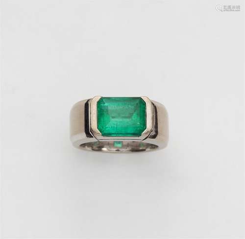 An 18k gold and natural Colombian emerald ring