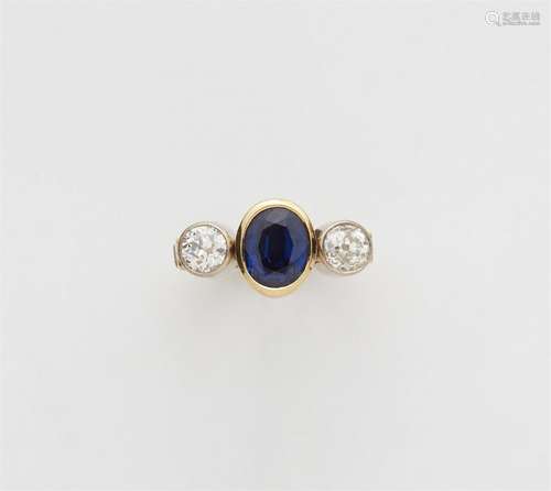 An 18k gold sapphire trinity ring