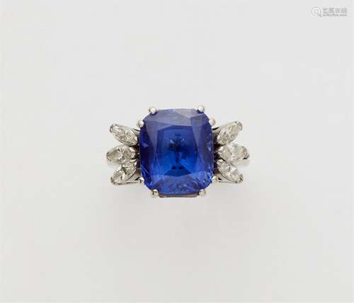 A 14k white gold tanzanite and diamond ring