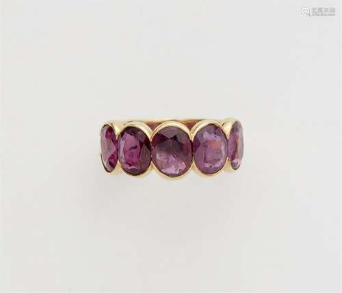 An 18k gold five-stone sapphire ring