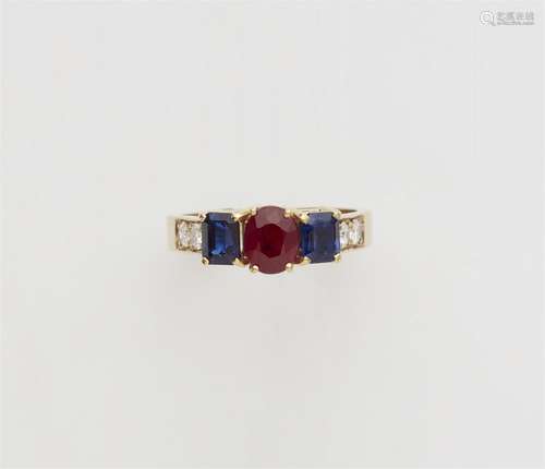 An 18k gold gemstone ring