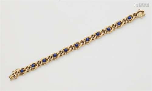 A 14k gold lapiz lazuli bracelet